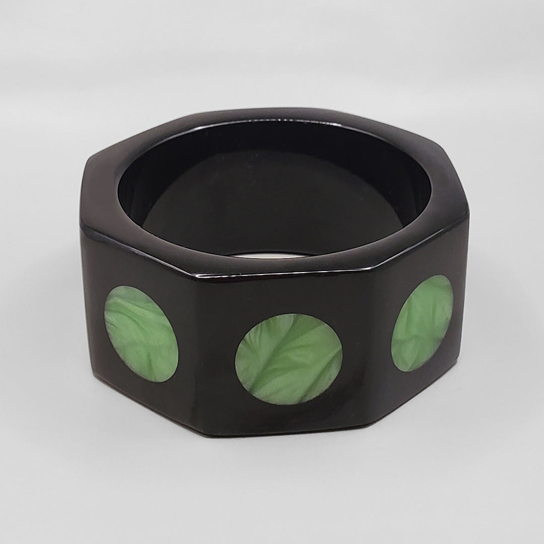 BLACK OCTAGON WITH  GREEN MOONS